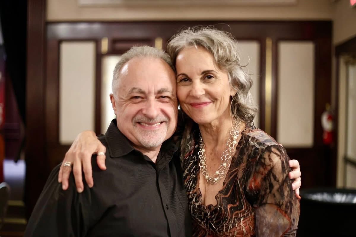A couple celebrating together at a past Austin Tango Marathon