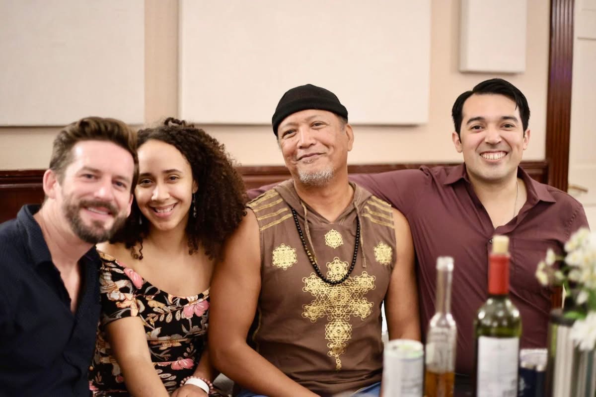 Four friends gathered at an Austin Tango Marathon table