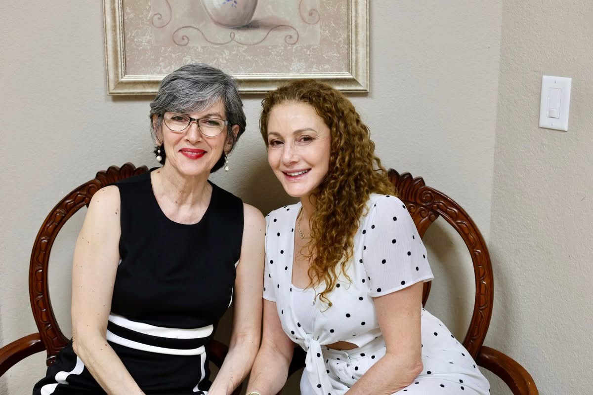 Two friends seated together at Austin Tango Marathon